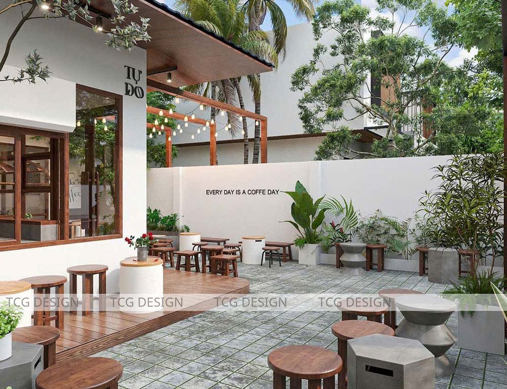 Thiết kế quán cafe sân vườn với không gian cây xanh bao quanh tạo vẻ đẹp thiên nhiên.