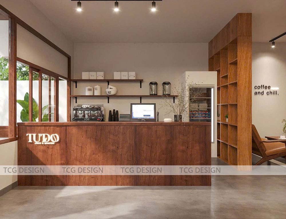 Thiết kế quán cafe sân vườn với quầy bar gỗ bên trong được bày trí đơn giản và ấn tượng.